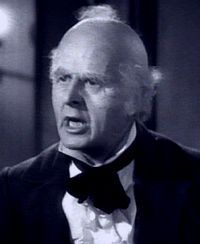 Reginald Owen interpretando a Ebenezer Scrooge en A Christmas Carol (1938), de Edwin L. Marin